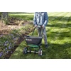 image:imageScotts Turf Builder EdgeGuard DLX Broadcast Spreader  Spreader for Lawn Fertilizer Weed amp Insect Control Grass Seed and Ice Melt Holds Up to 15000 sq ft of ProductSingle Pack